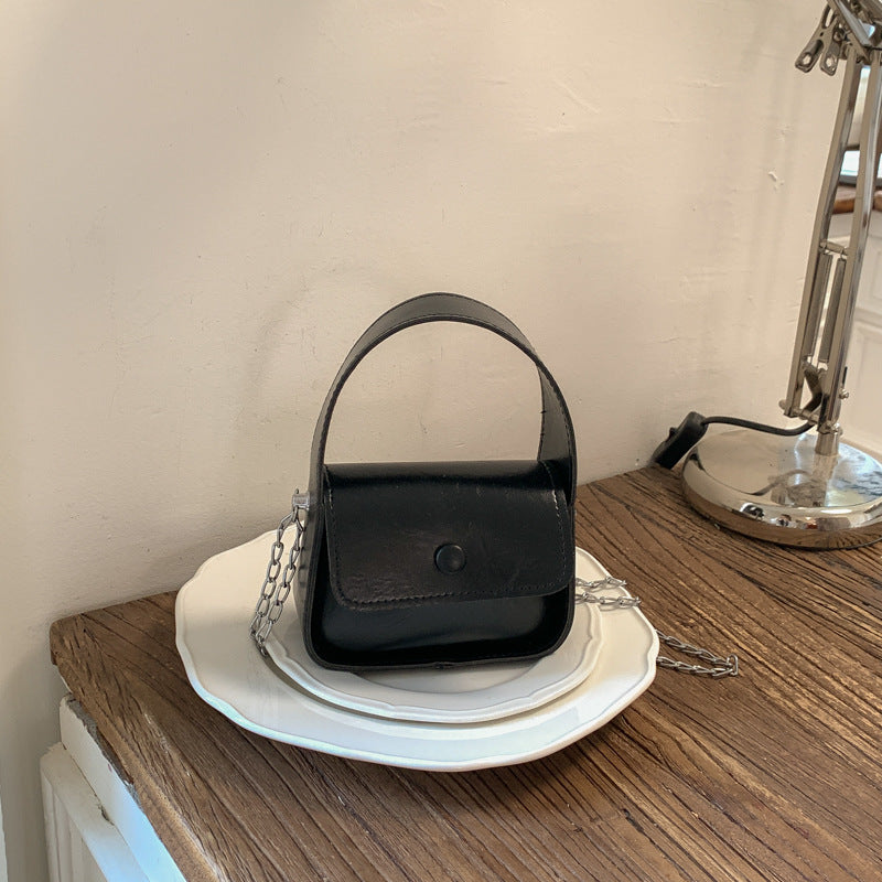 Vintage-inspirierte Lederhandtasche