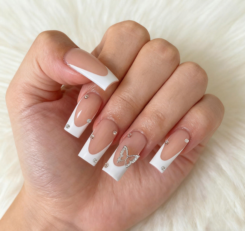 Kunstvolle Nagelset mit Schmetterlingsverzierung Karnz