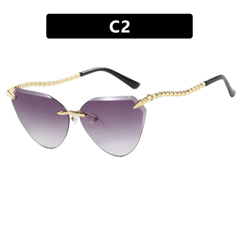 Damen Cat-Eye Sonnenbrille mit einzigartigem goldenen Rahmendesign und schützenden Gläsern Karnz