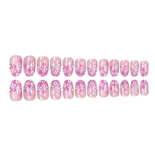 Kunstnagelset mit floralem Design und glitzernden Akzenten Karnz