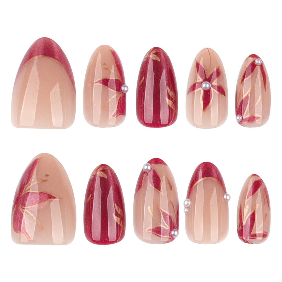 Kunstvolle Nagelverlängerungen mit retro-inspiriertem floralem Design Karnz