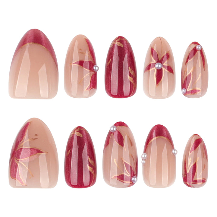Kunstvolle Nagelverlängerungen mit retro-inspiriertem floralem Design Karnz