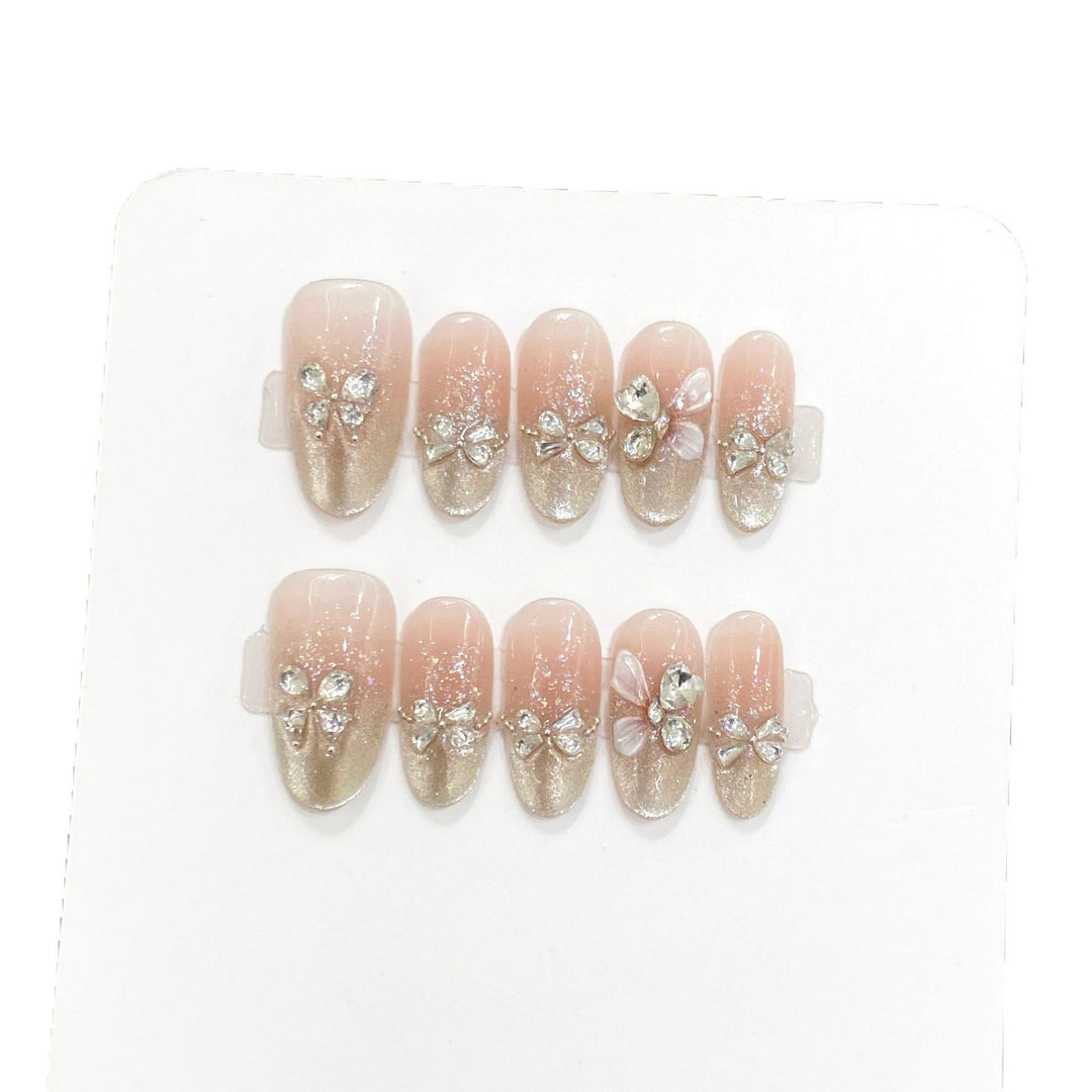 Dekoratives Press-On Nagelkunst-Set mit Rhinestone-Bow-Akzenten
