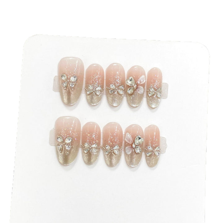Dekoratives Press-On Nagelkunst-Set mit Rhinestone-Bow-Akzenten