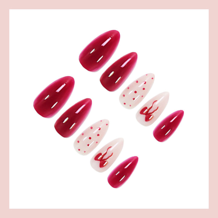 Kunstnagelset mit stilvollen Frucht- und Pluster-Designs Karnz