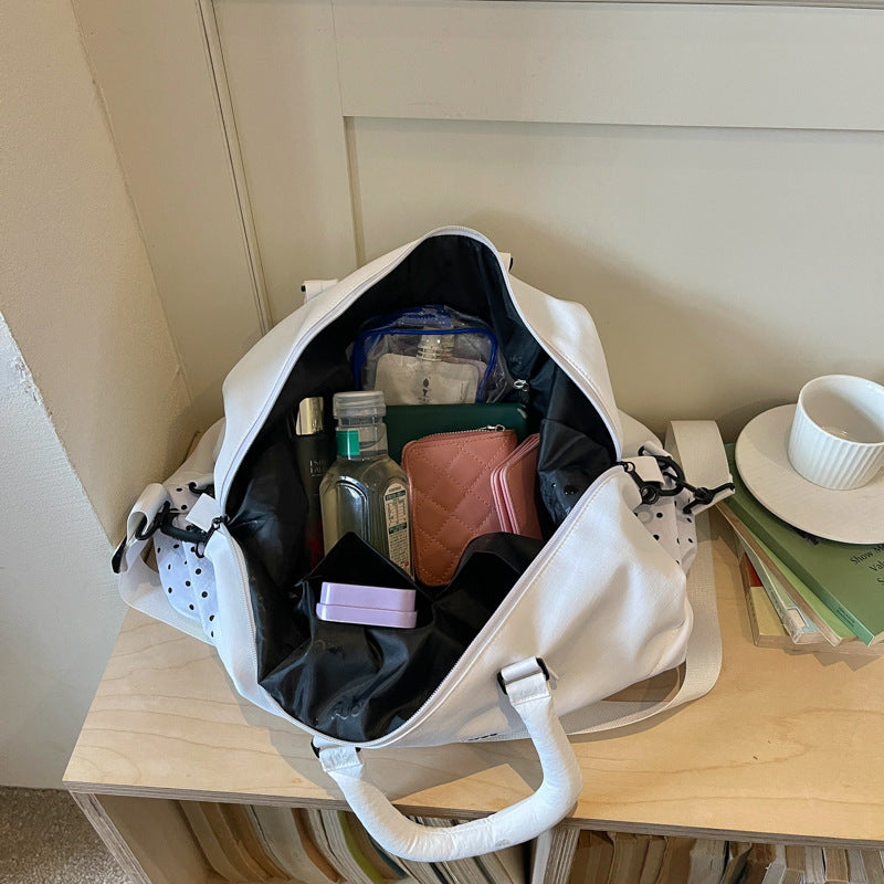 Stilvolle gepunktete Reis-Tasche Karnz