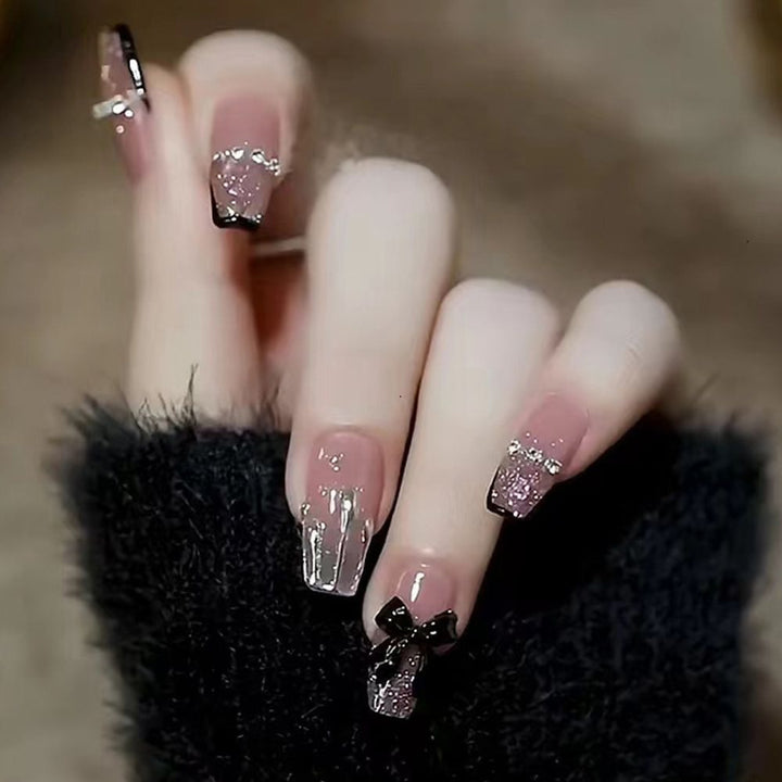 Kunstnegel-Set mit Glitzer und Schleifenmotiv Karnz