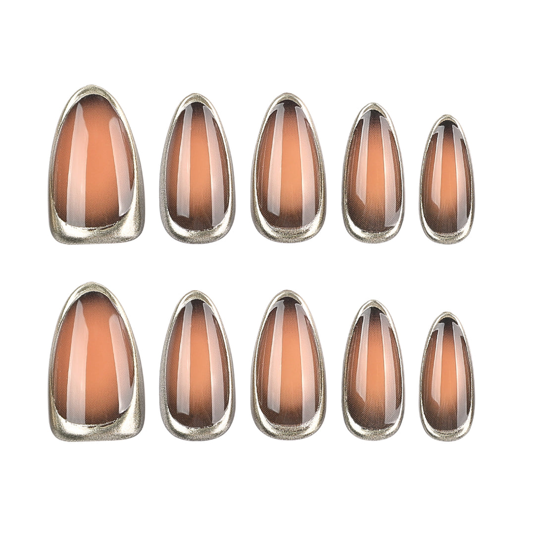 Glamouröse Stiletto-Nägel mit elegantem Goldrand Karnz