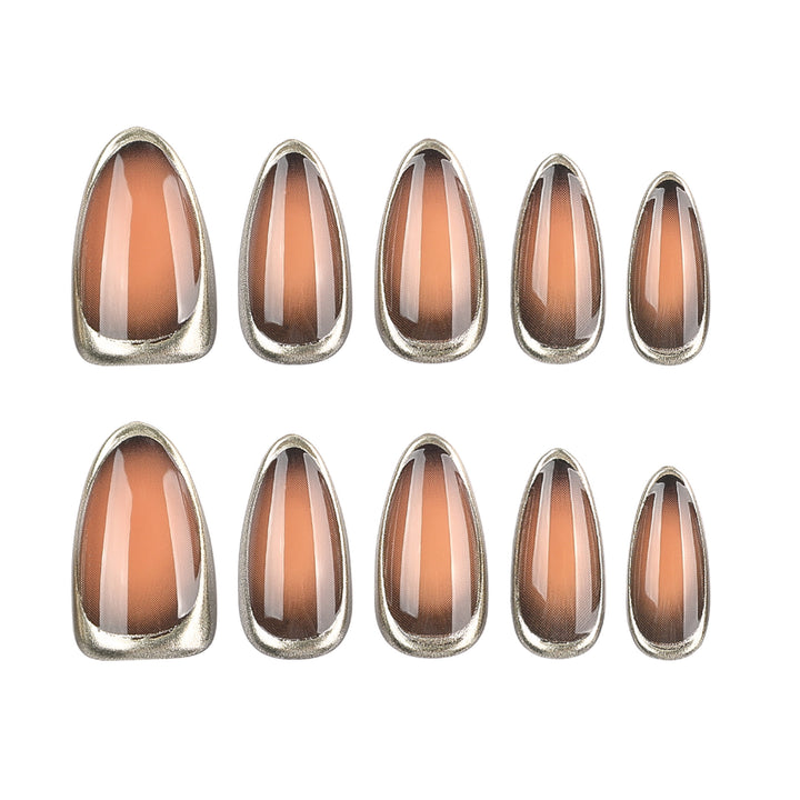 Glamouröse Stiletto-Nägel mit elegantem Goldrand Karnz