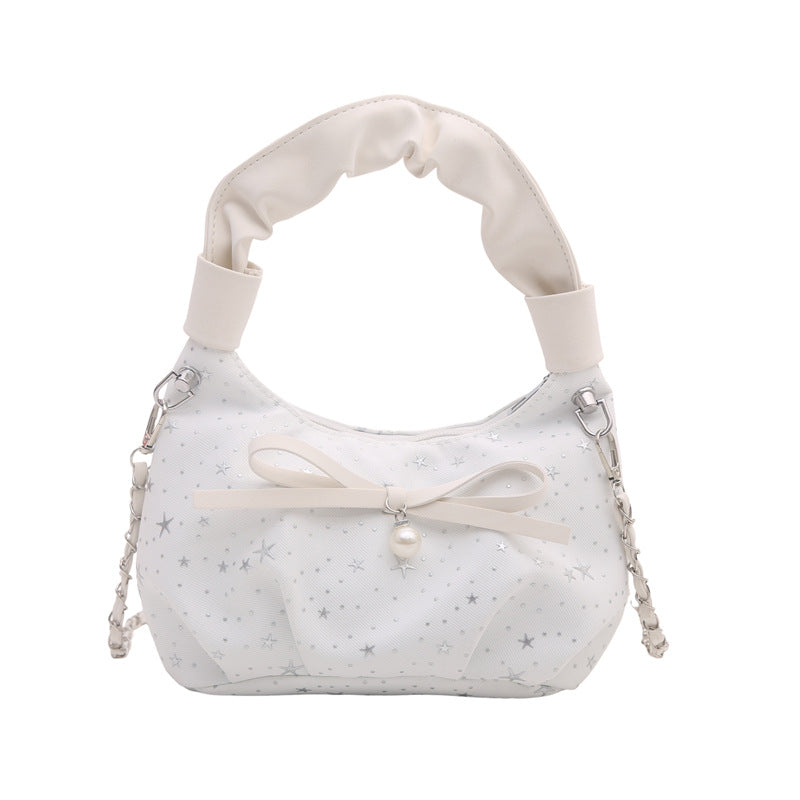 Elegante Handtasche mit Schleifendetail und Sternenprint