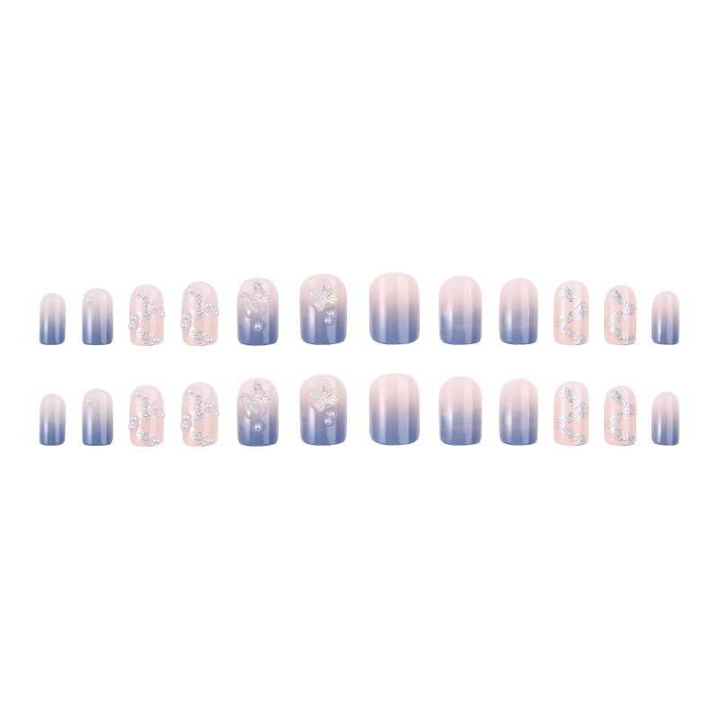 Kunstnagelset mit funkelnden Glitzer-Elementen und ansprechendem Ombre-Design Karnz