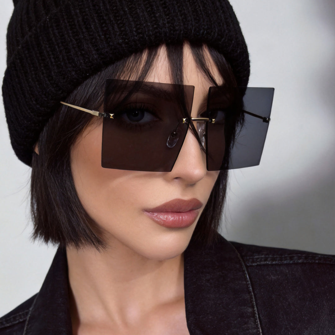 Damen modische quadratische Sonnenbrille mit breiten Gläsern und filigranem Metallrahmen Karnz