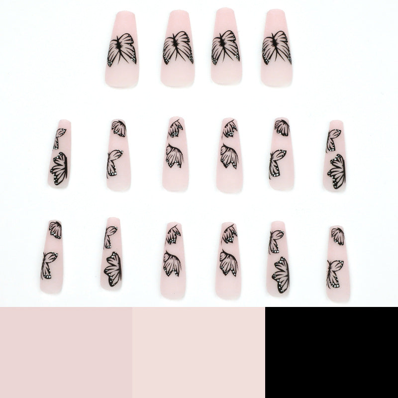 Kunstvolle Nagelverlängerungen mit Schmetterlingsdesign Karnz