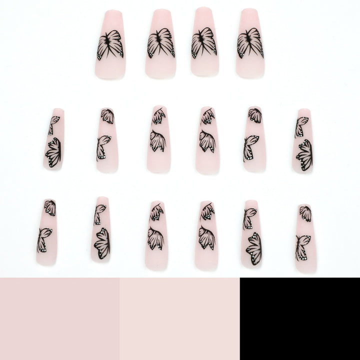Kunstvolle Nagelverlängerungen mit Schmetterlingsdesign Karnz