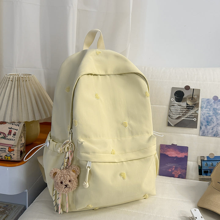 Vielseitiger lässiger Rucksack mit lustigem Charakteranhänger Karnz