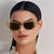 Damen Luxus Sonnenbrille mit elegantem Schmetterlings-Detail Karnz