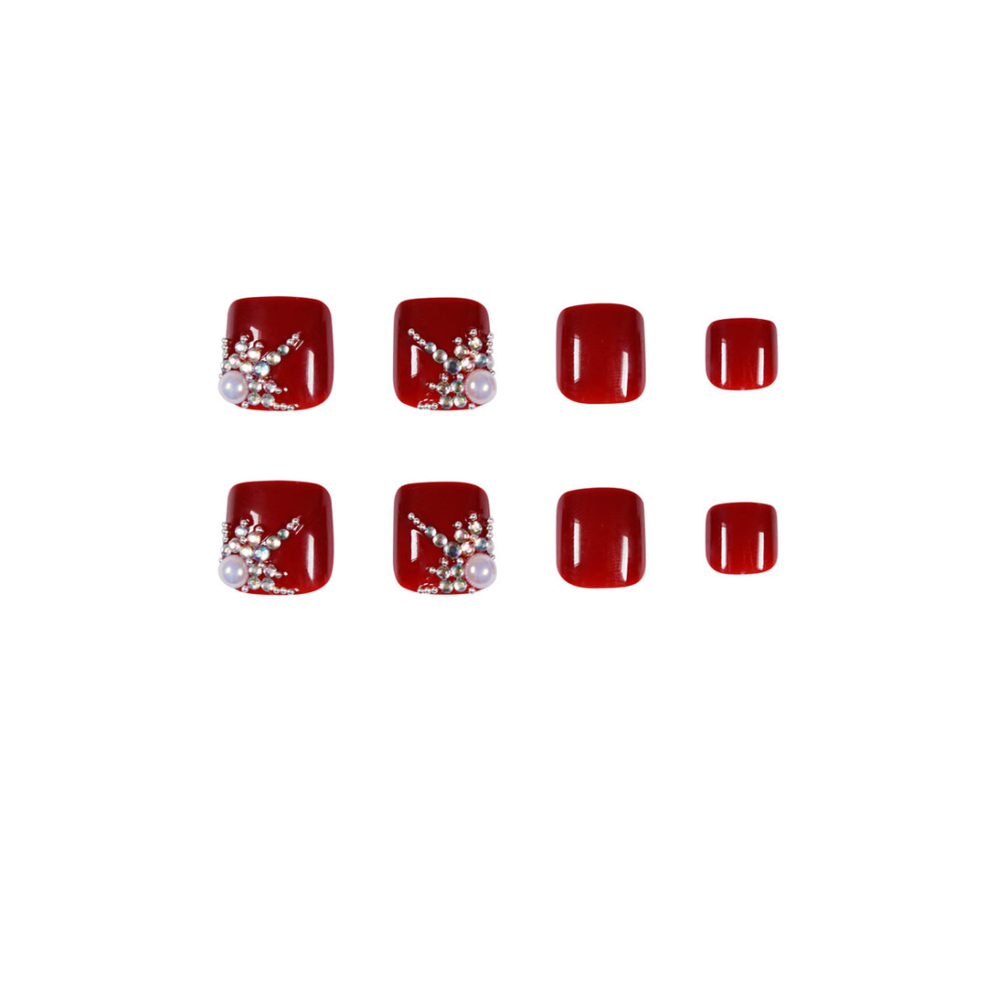 Kunstvolle Fußnagelgestaltung mit elegantem Strass-Design Karnz