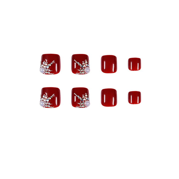 Kunstvolle Fußnagelgestaltung mit elegantem Strass-Design Karnz