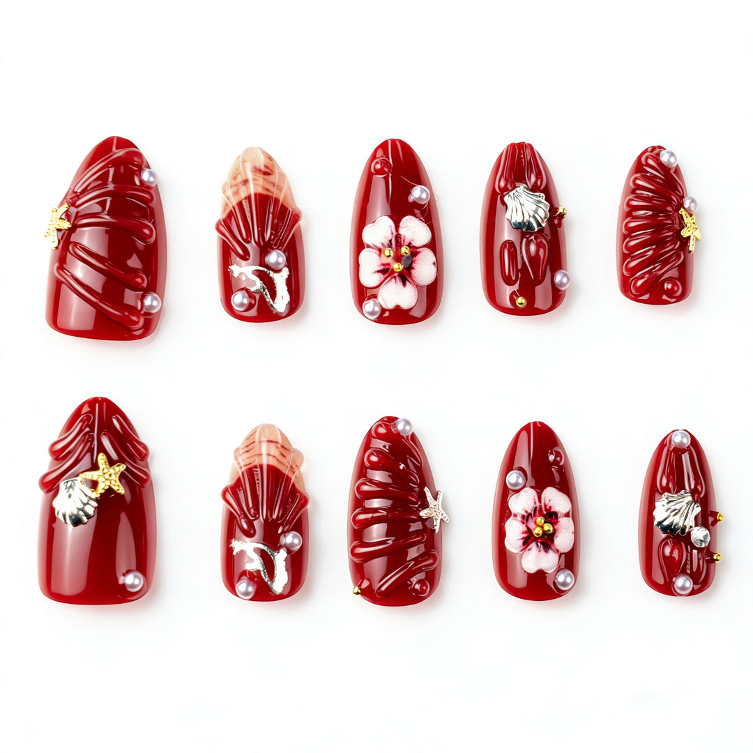 Künstlerisches Press-On Nagelkunst Set mit floralen und Muschel-Designs Karnz