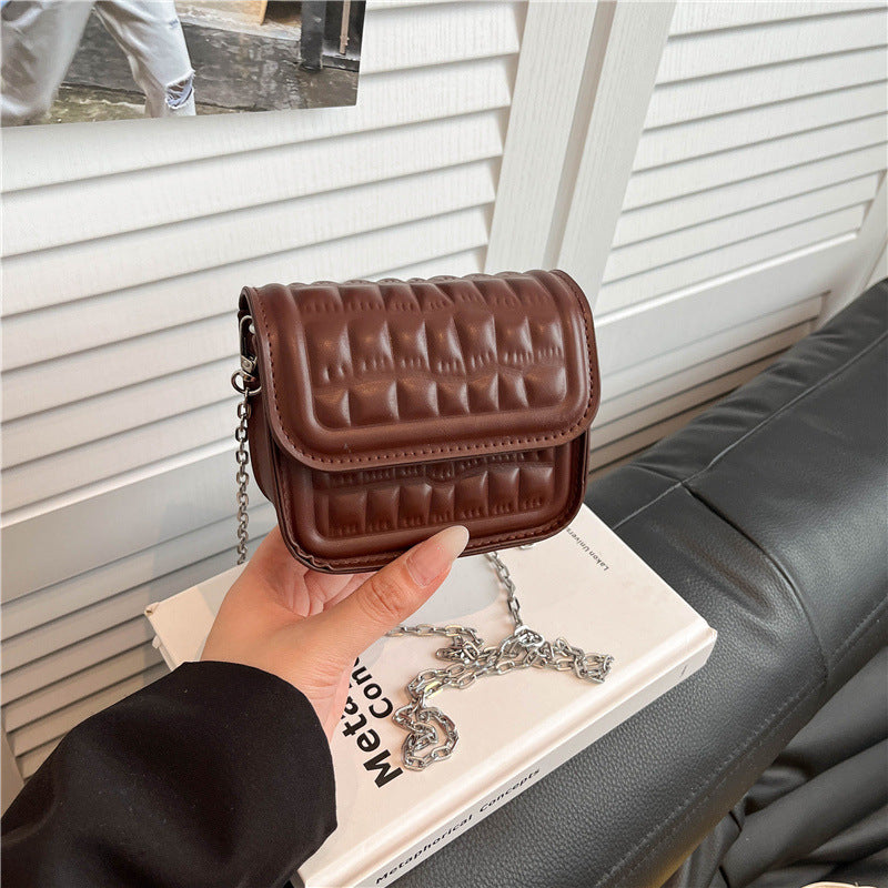 Texturiert gesteppte Mini-Crossbody-Tasche Karnz