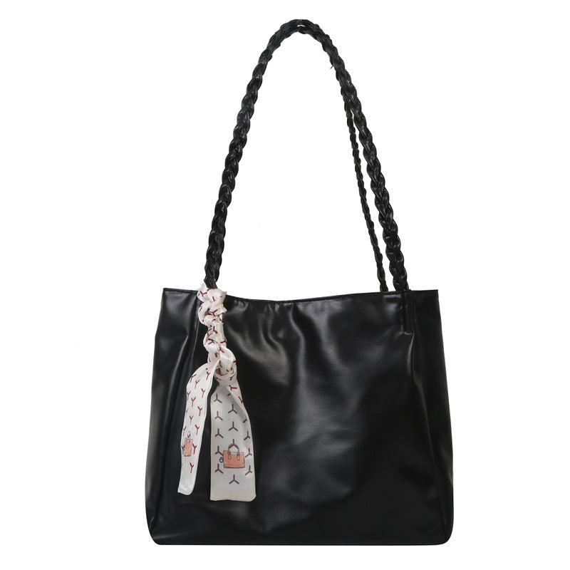 Glänzende Kunstleder Shopper Tasche mit geflochtenen Trägern