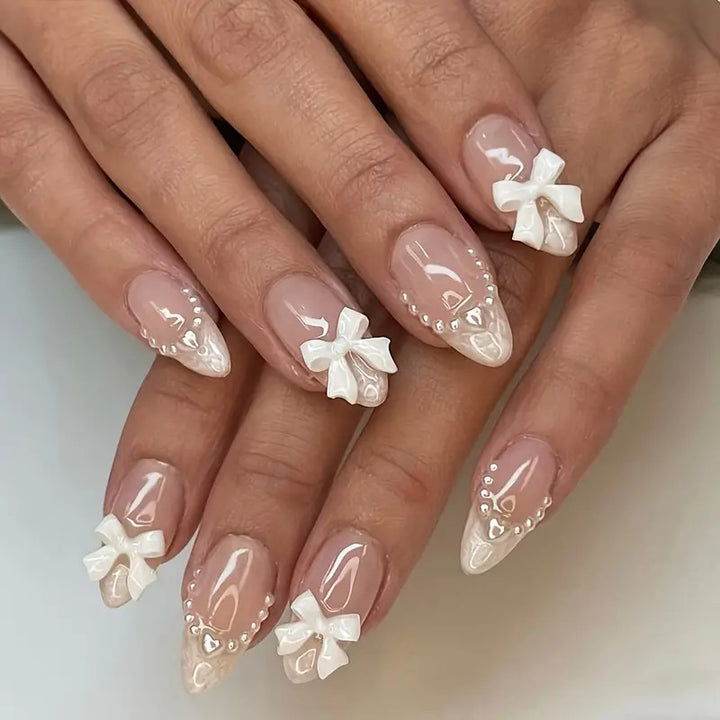 Elegante mit Schleife verzierte Press-On Nagelkunst Karnz