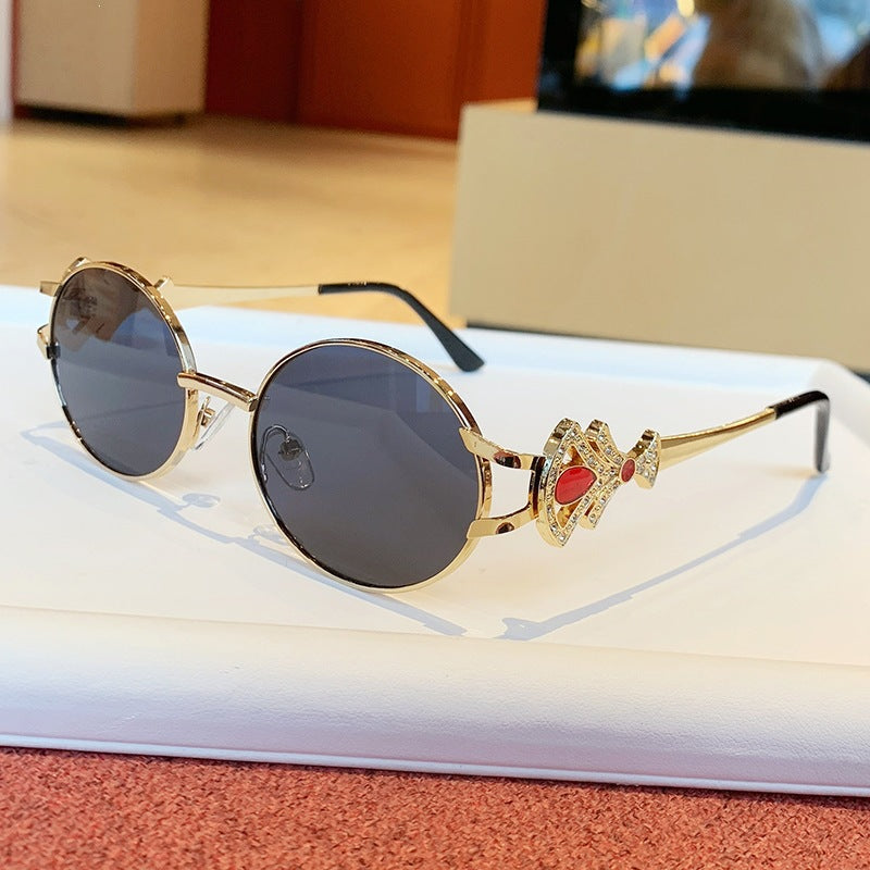 Damen elegante rechteckige Sonnenbrille mit glamourösen Verzierungen Karnz