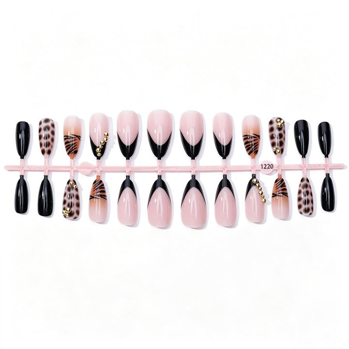 Kunstnagelset mit eleganten Tier- und Glitzermustern Karnz