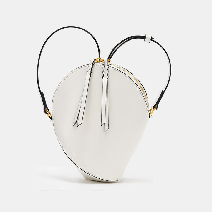 Skulpturales Tropfen-Crossbody-Bag mit verstellbarem Riemen & Quastenreißverschluss