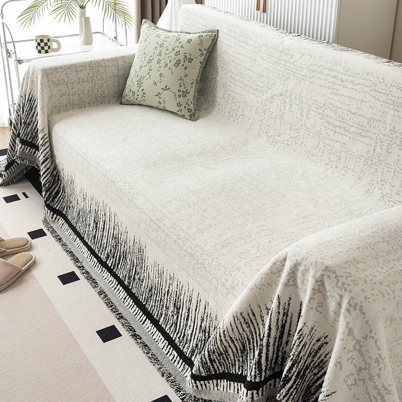 Gemütliche gestrickte Sofa-Decke