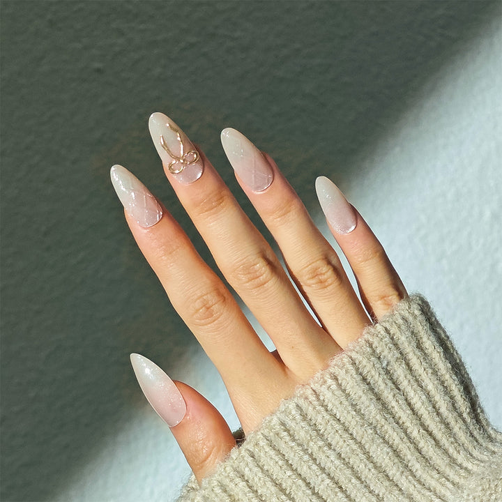 Elegante Stiletto Press-On Nägel mit Schleifenakzenten Karnz