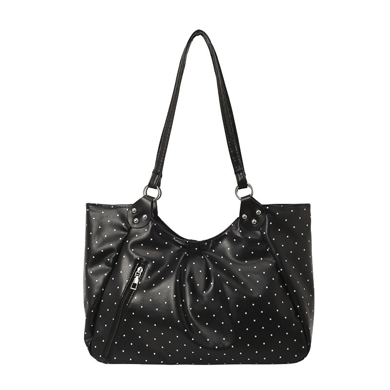 Stilvolle gepunktete Sling Bag