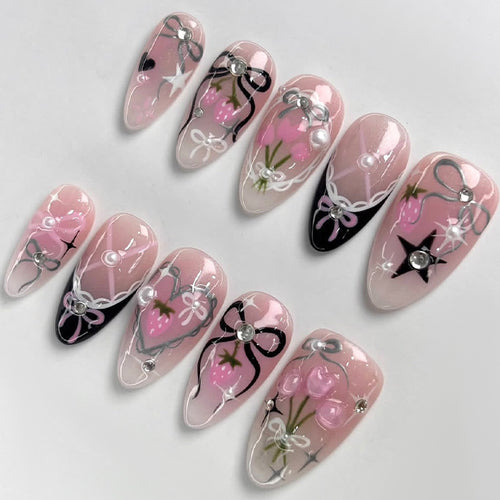 Dekoratives Press-On Nagelkunstset mit Schleifen- und Sternmotiven Karnz