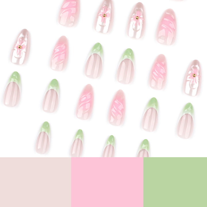 Kunstvolle Nagelverlängerungen mit floralem Design und glamourösen Akzenten Karnz