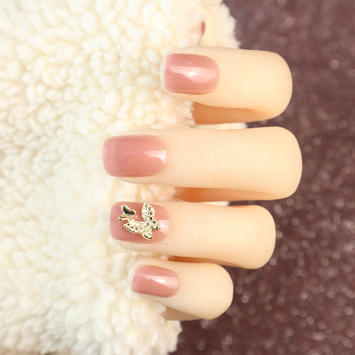 Elegantes Press-On-Nagelset mit Schmetterlingsakzenten