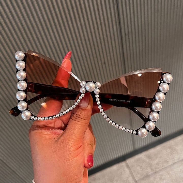 Damen auffällige Sonnenbrille mit Perlenverzierung Karnz