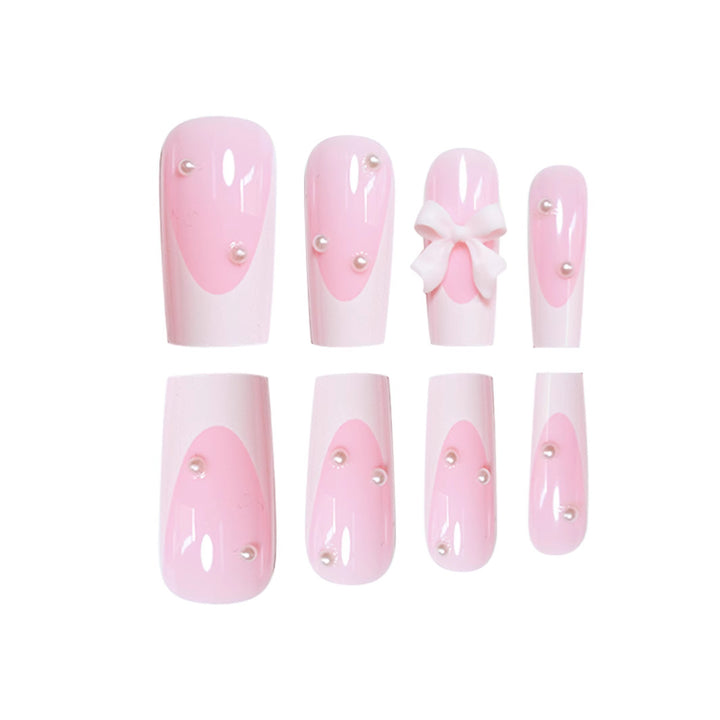Dekorative Presse-Nagelkunst mit Schleifendetails Karnz