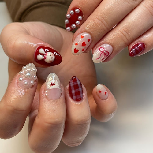 Kreatives Kunstnagelset mit niedlichen Hasen- und Herzen-Motiven Karnz