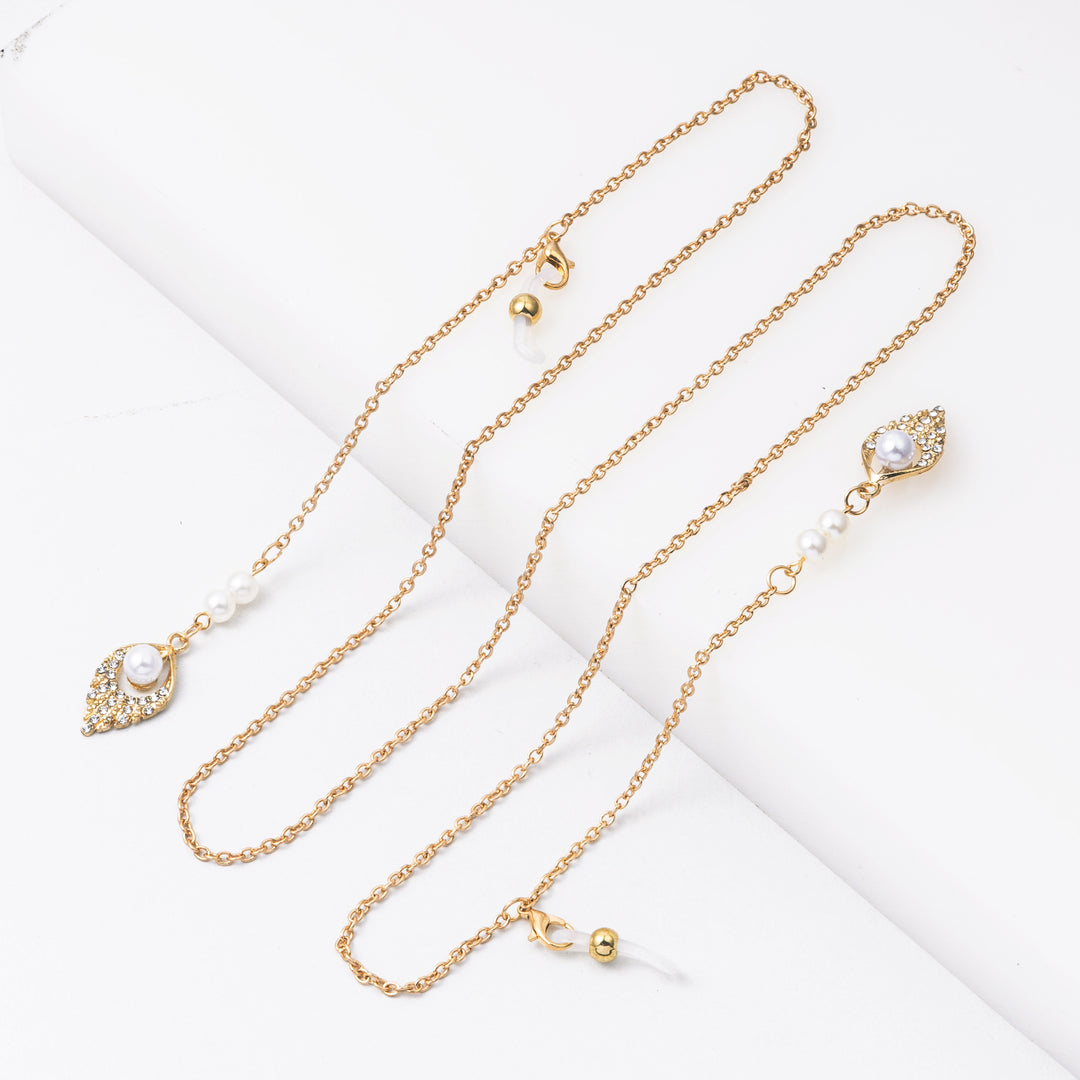 Elegante Perlenohrringe mit Kette Karnz
