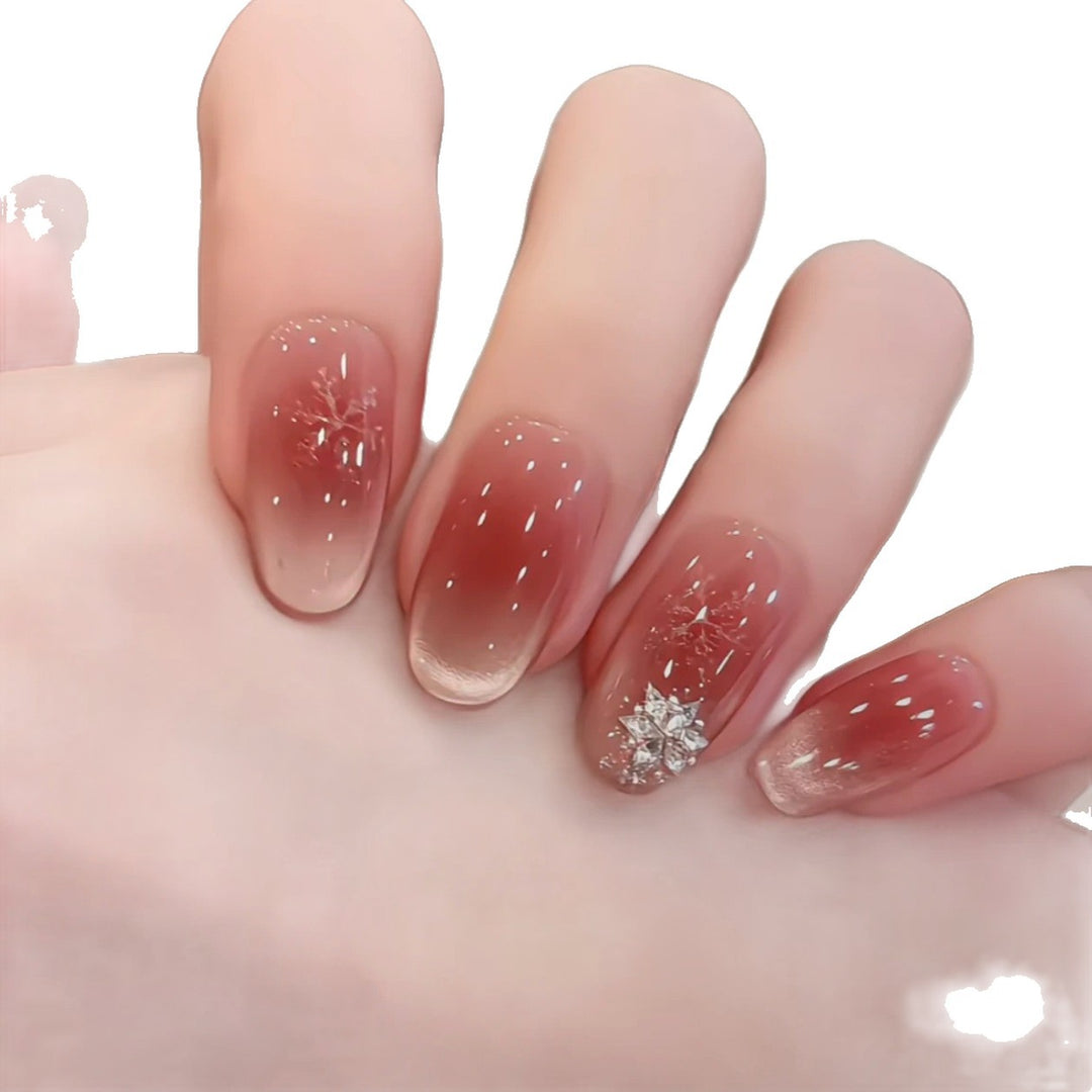 Ombre-Gel-Nagelerweiterungen mit dekorativen Akzenten