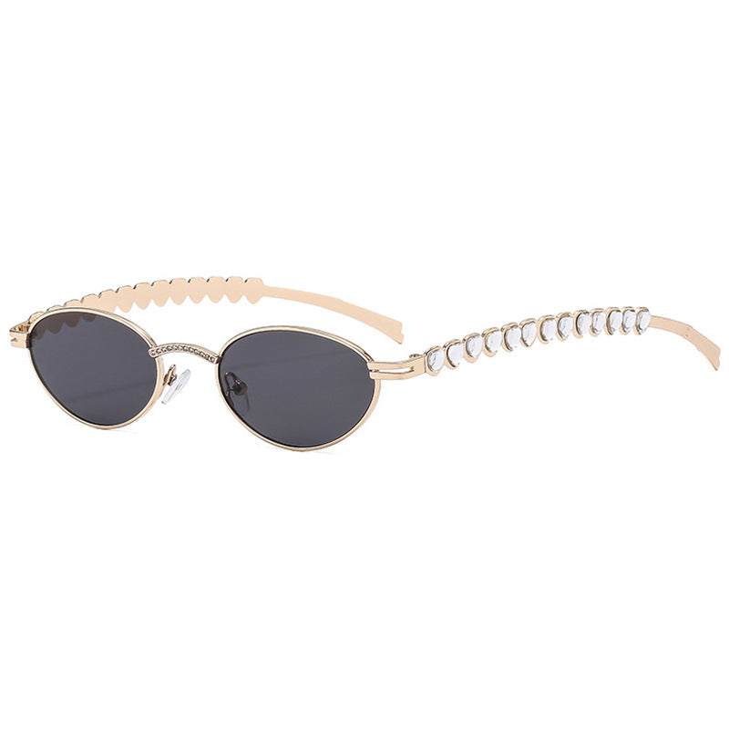 Damen modische Sonnenbrille mit dekorativem Rahmen und stilvollen Akzenten Karnz