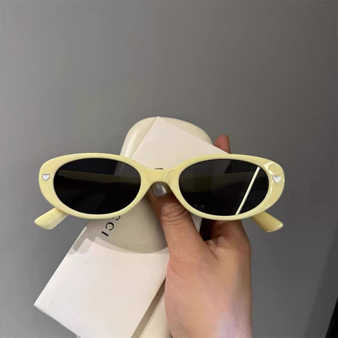 Modische Cat-Eye Sonnenbrille mit Herzen Karnz