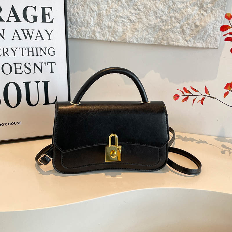 Elegante Tasche mit Riegelverschluss