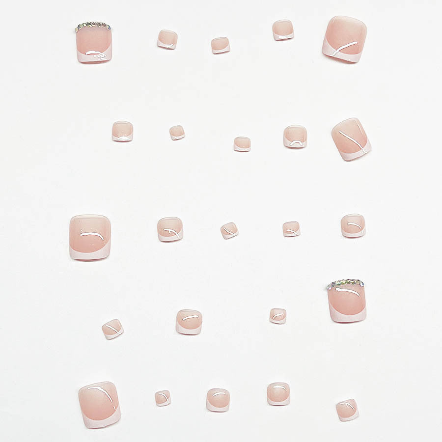 Fußnagelkunstset mit elegantem französischen Design und funkelnden Akzenten Karnz