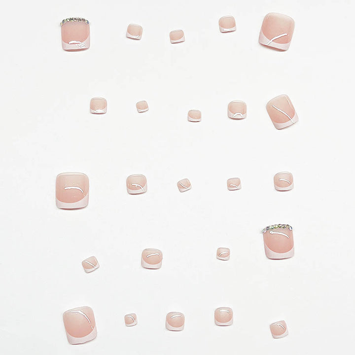 Fußnagelkunstset mit elegantem französischen Design und funkelnden Akzenten Karnz