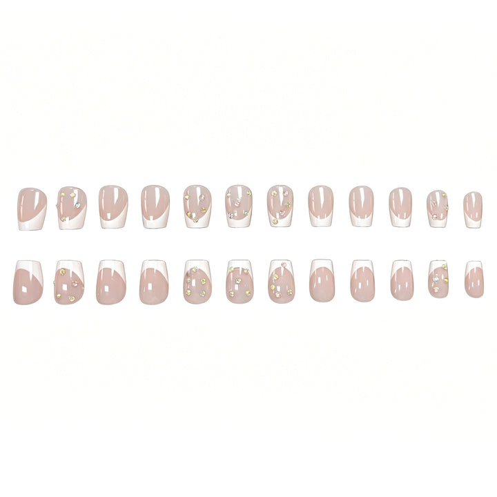 Elegante French Tip Nagelkunst-Verstärkungen mit Edelsteinakzenten Karnz