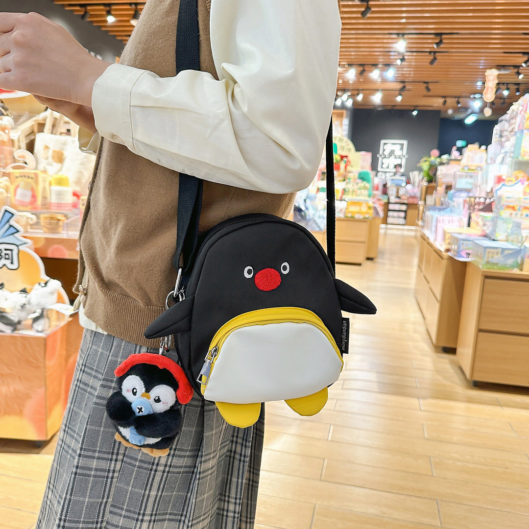 Verspielte Pinguin-Themen Umhängetasche