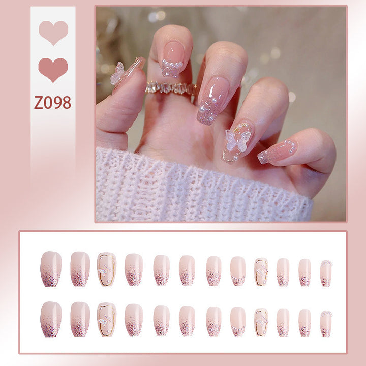 Kunstnagelset mit elegantem French-Tipp und Glitzerakzenten Karnz