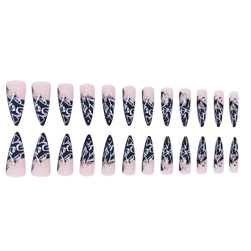 Künstlerische Stiletto Press-On Nägel mit abstraktem Design Karnz
