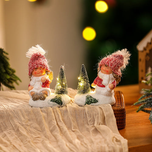 Niedliche Weihnachtsfigur mit Lichterschmuck Karnz